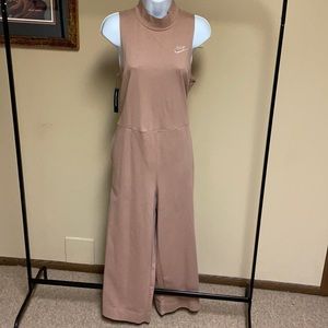 Nike Capri romper with pockets.